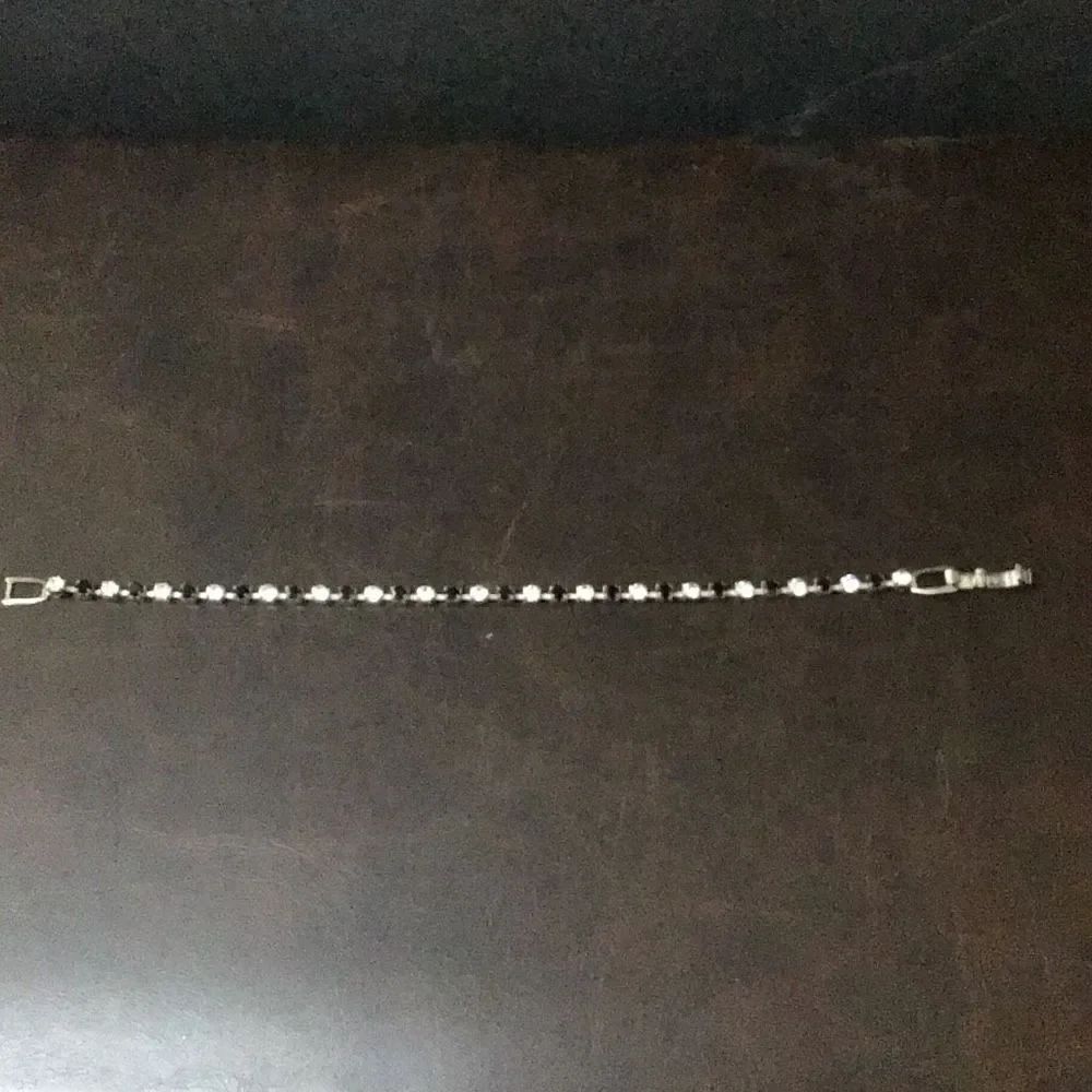 Bracelet, sapphire, and diamond like item from estate sale